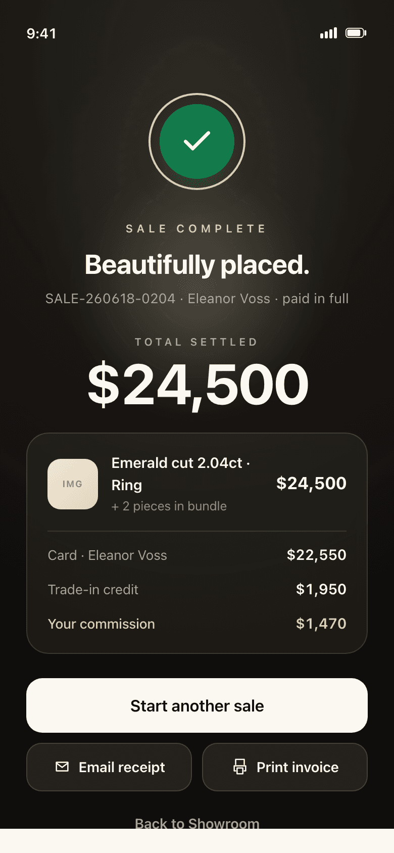 A sale just completed on a phone: the piece, the total settled, the card and trade-in split, and the commission earned.